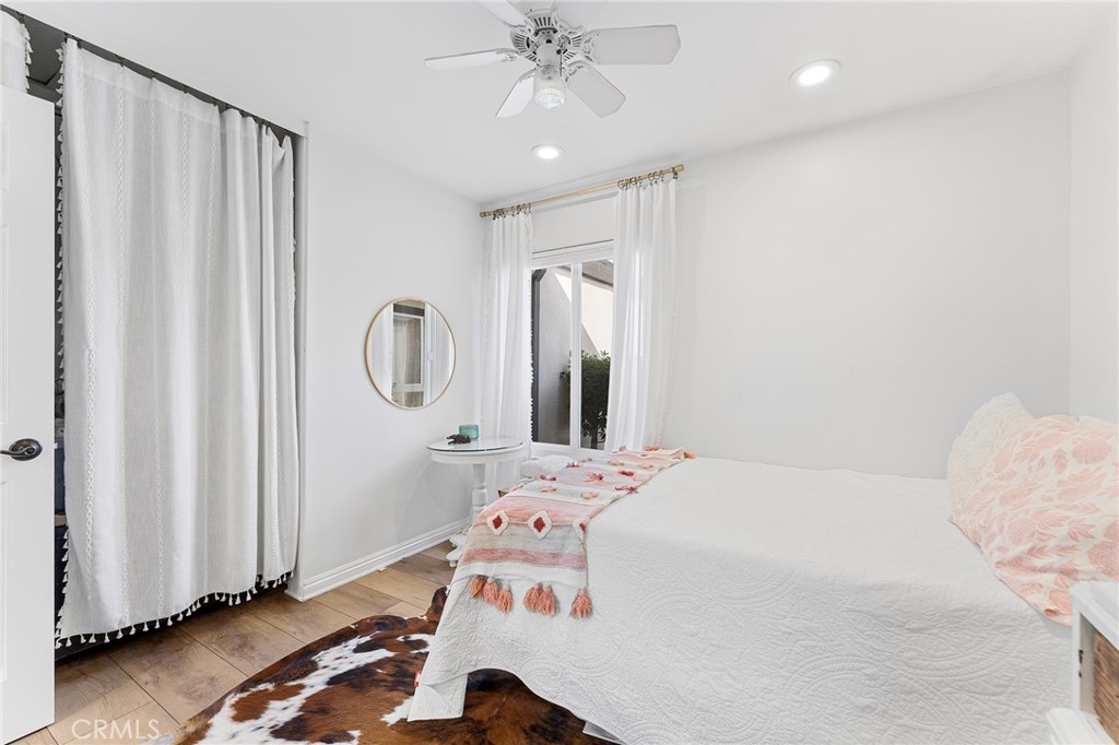 4326 Via Verde Cypress, CA 90630 - Photo 32 of 43 a bedroom with a bed and a mirror