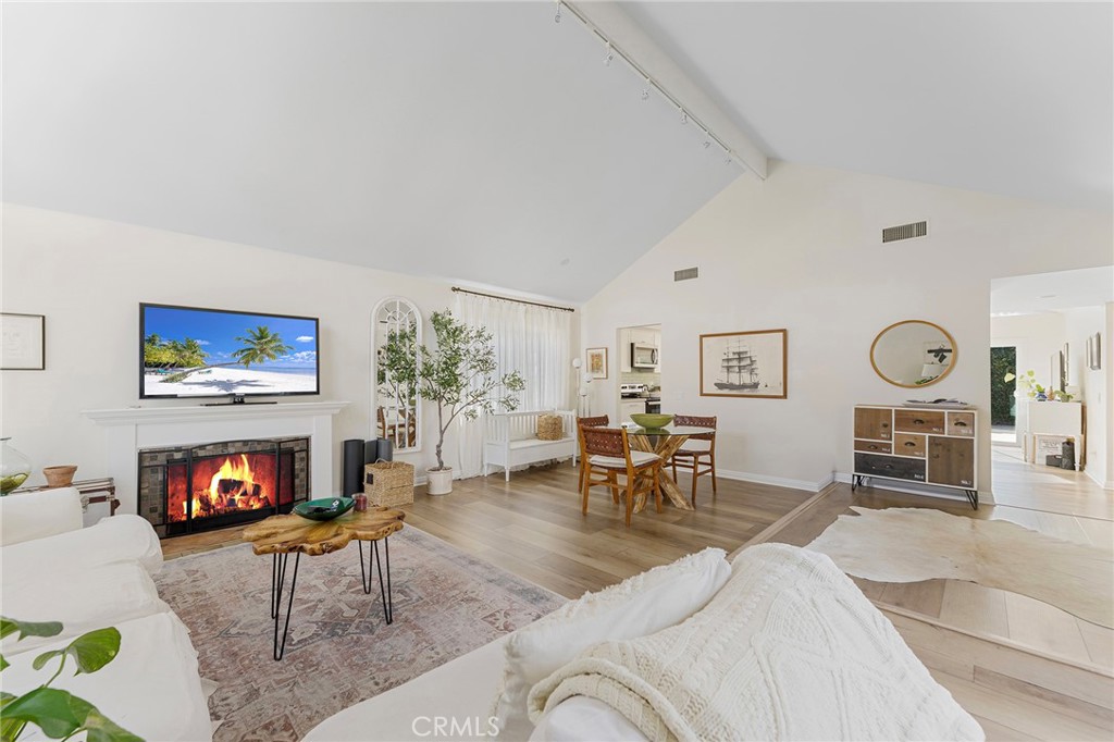 4326 Via Verde Cypress, CA 90630 - Photo 10 of 43 a living room with furniture and a fireplace