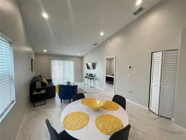 a large living room with a couch