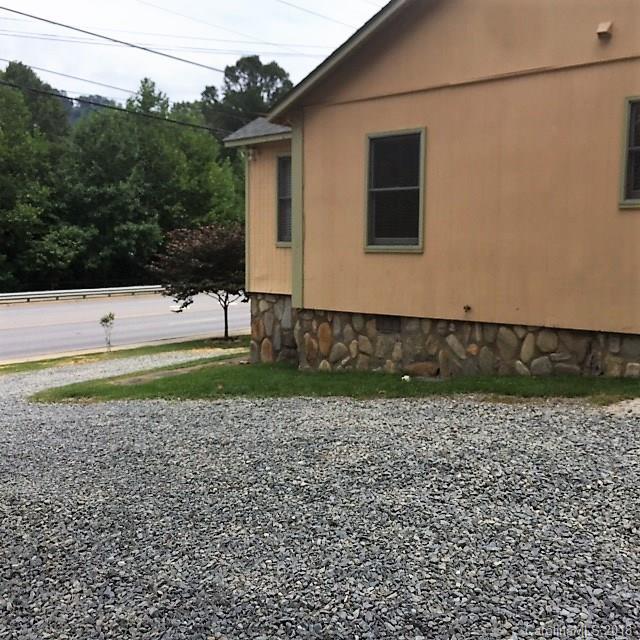 977 Soco Road Maggie Valley, NC 28751 - Photo 2 of 12 a view of a house with a backyard
