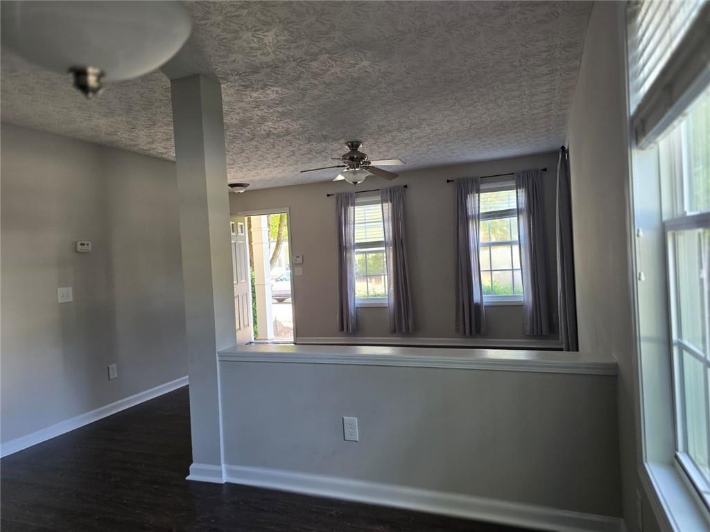 136 Alice Walker Drive Athens, GA 30607 - Photo 7 of 11 a view of a hallway with windows and chandelier
