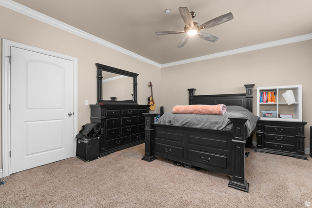 476 West 200 N Street, Unit 206 Springville, UT 84663 - Photo 10 of 24 Bedroom featuring light carpet, ornamental molding, and ceiling fan