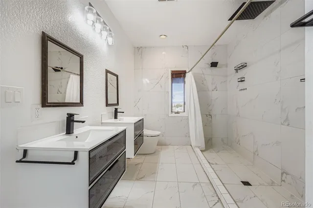 a view of a yard with wooden fence