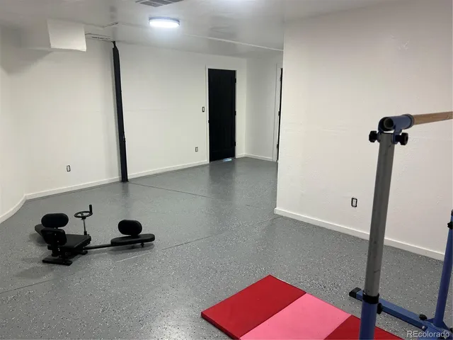 a view of a yard with large trees