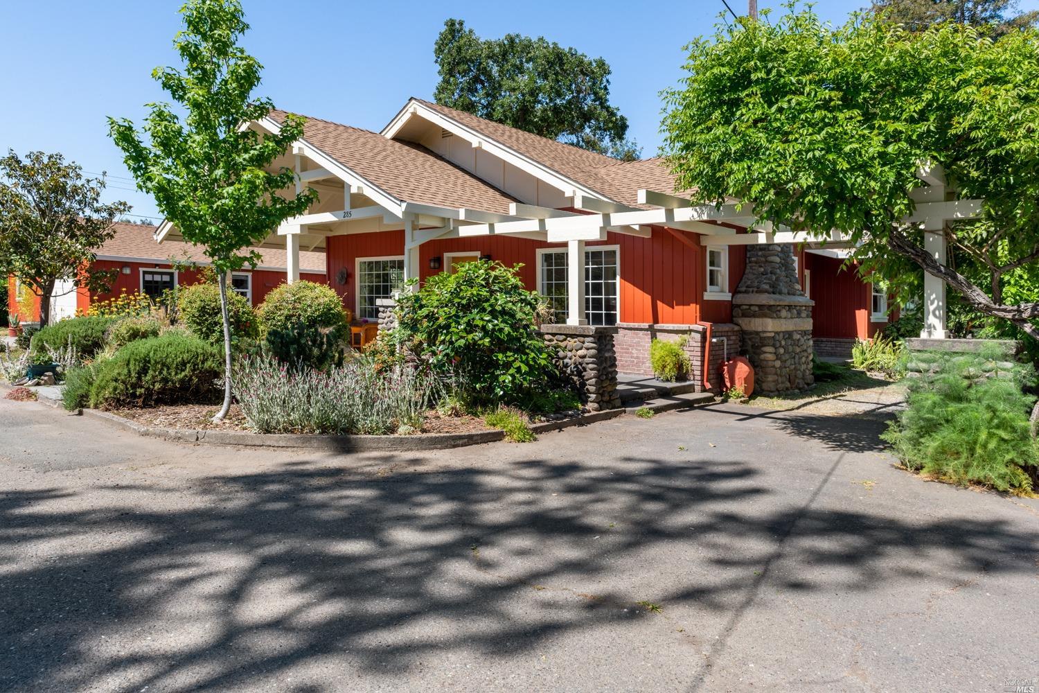 a view of a house with a street