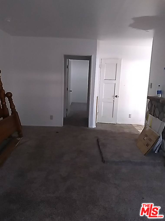 39174 Lebec Road Lebec, CA 93243 - Photo 22 of 27 a room with gym equipment and mirror