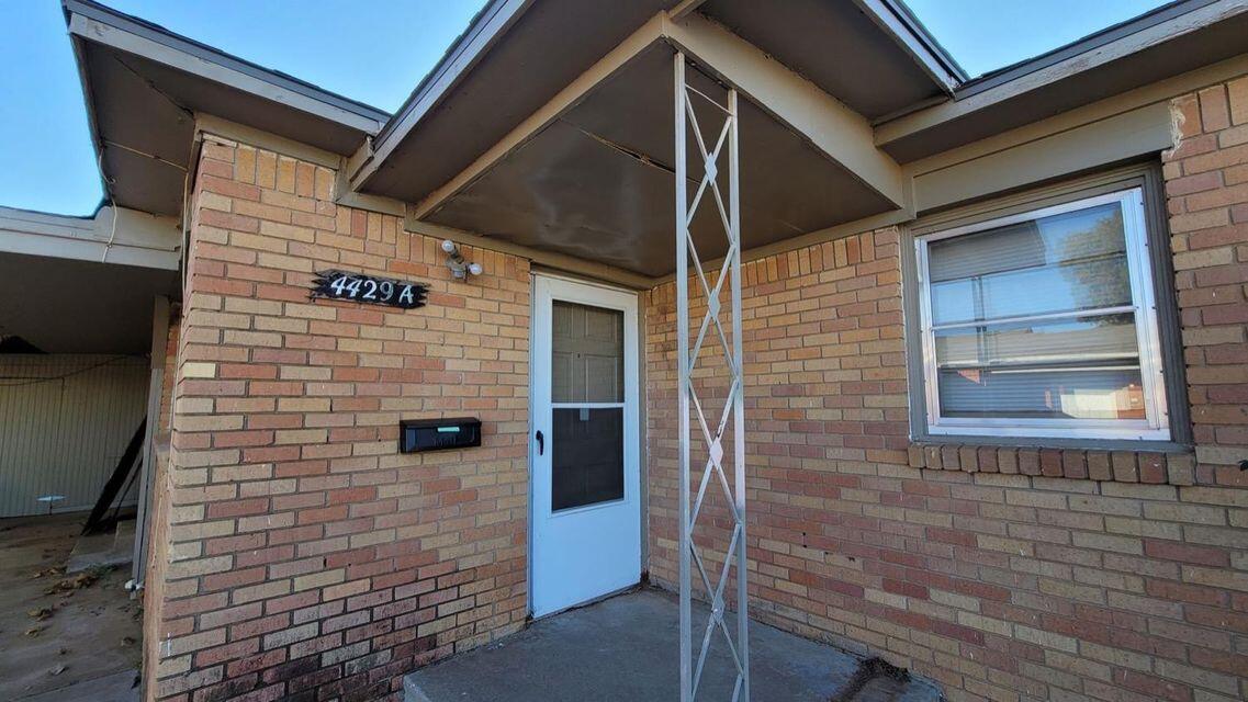 4429 31st Street Lubbock, TX 79410 - Photo 2 of 12 a view of door