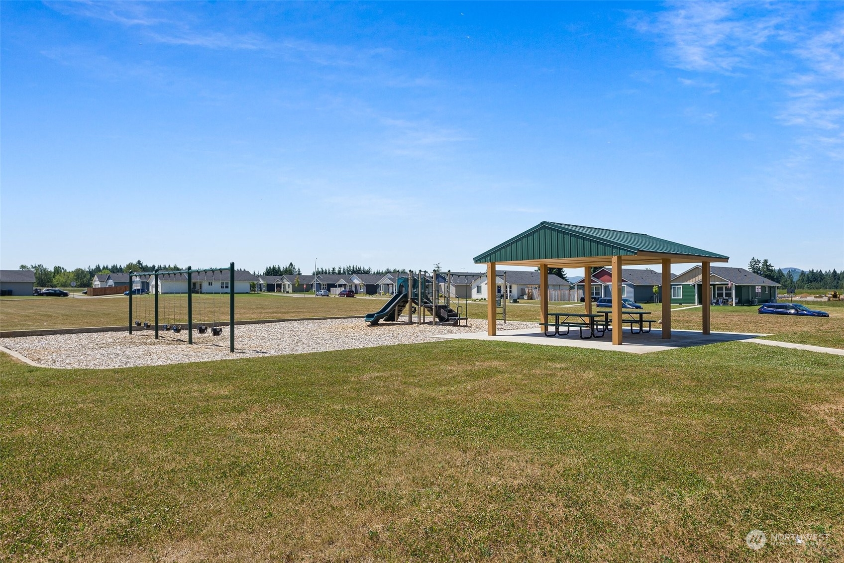 702 Roundtree Boulevard Winlock, WA 98596 - Photo 32 of 35 a view of a swimming pool with an outdoor seating and yard