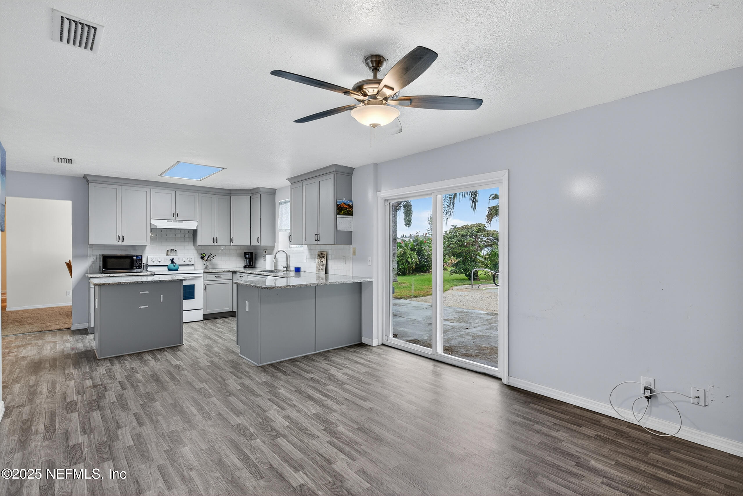 4429 Cedar Road Orange Park, FL 32065 - Photo 13 of 50 a view of kitchen with sink and wooden floor