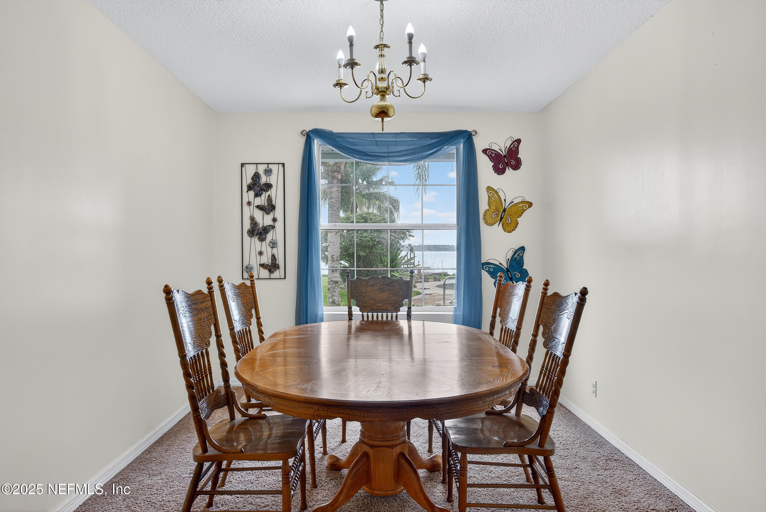 4429 Cedar Road Orange Park, FL 32065 - Photo 21 of 50 a view of a dining room with furniture window and outside view