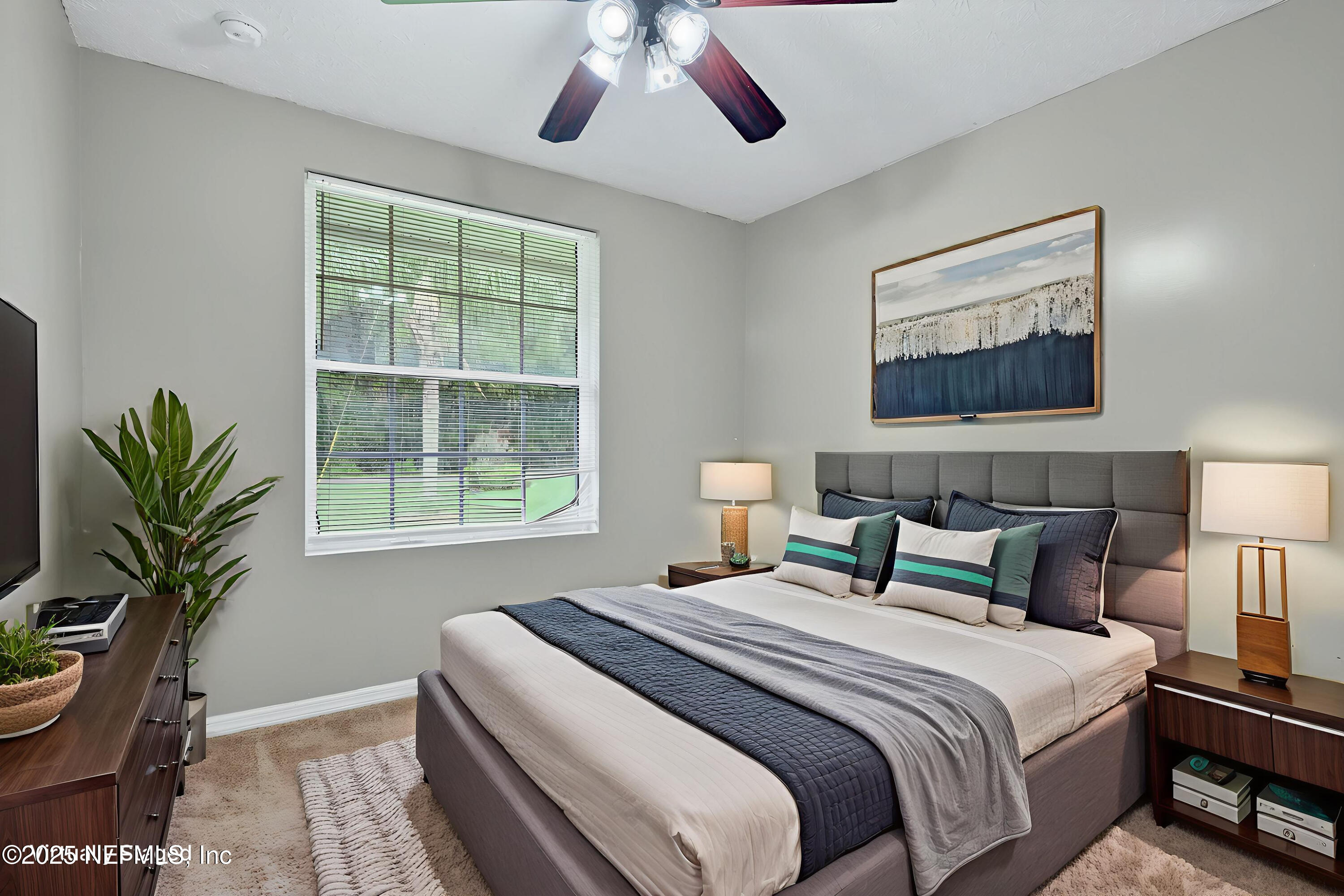 4429 Cedar Road Orange Park, FL 32065 - Photo 26 of 50 a bedroom with bed and a window