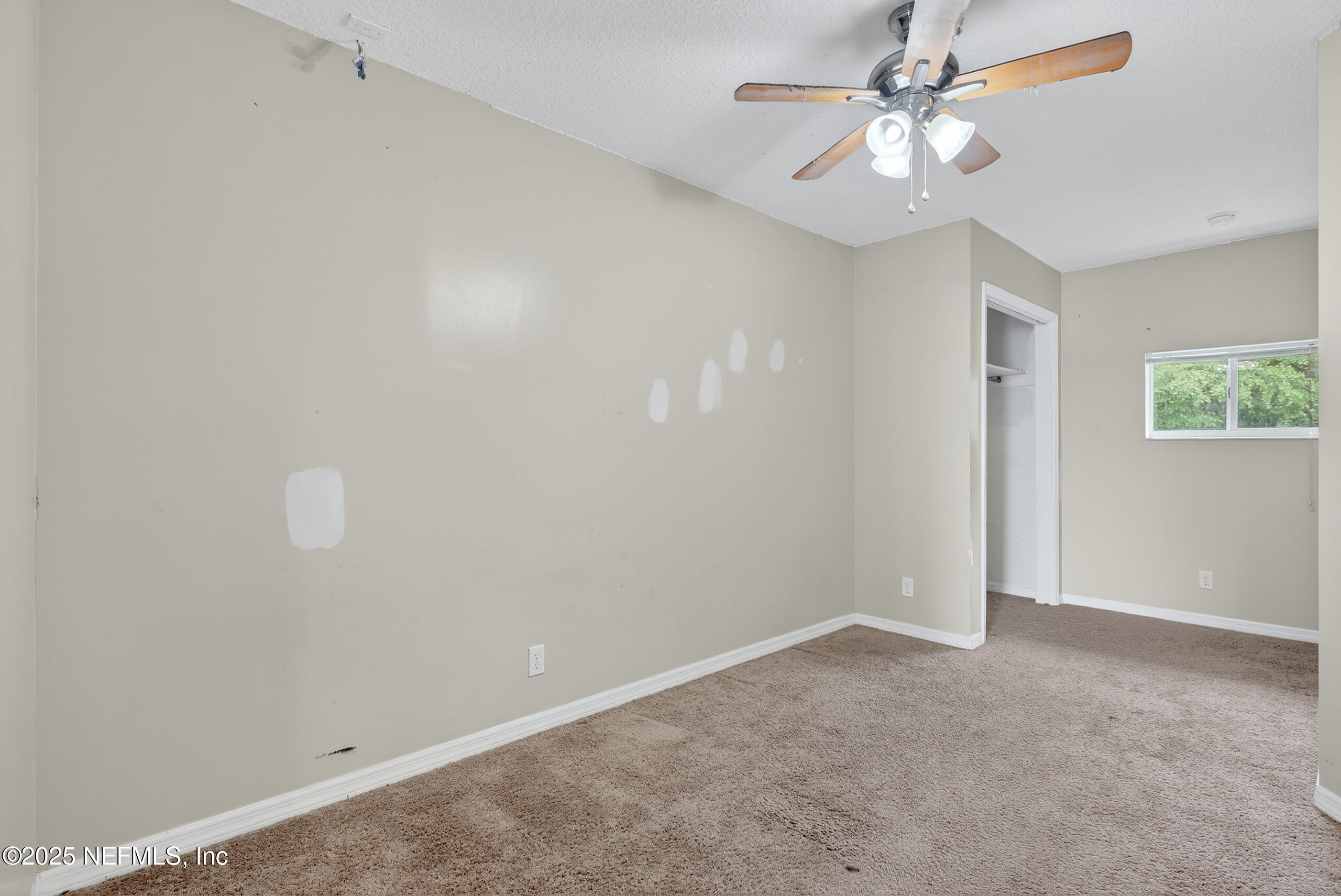 4429 Cedar Road Orange Park, FL 32065 - Photo 30 of 50 a view of an empty room with a fan