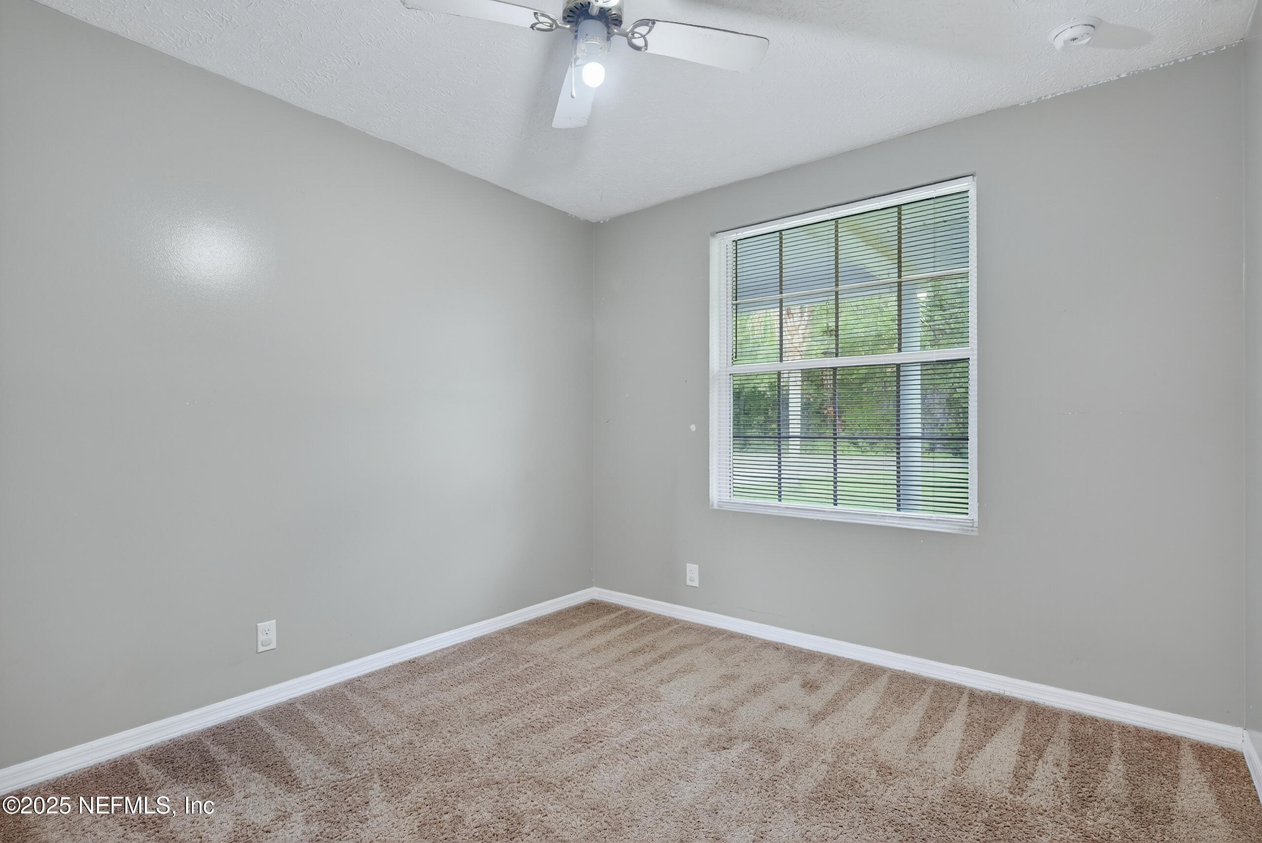 4429 Cedar Road Orange Park, FL 32065 - Photo 34 of 50 an empty room with a window