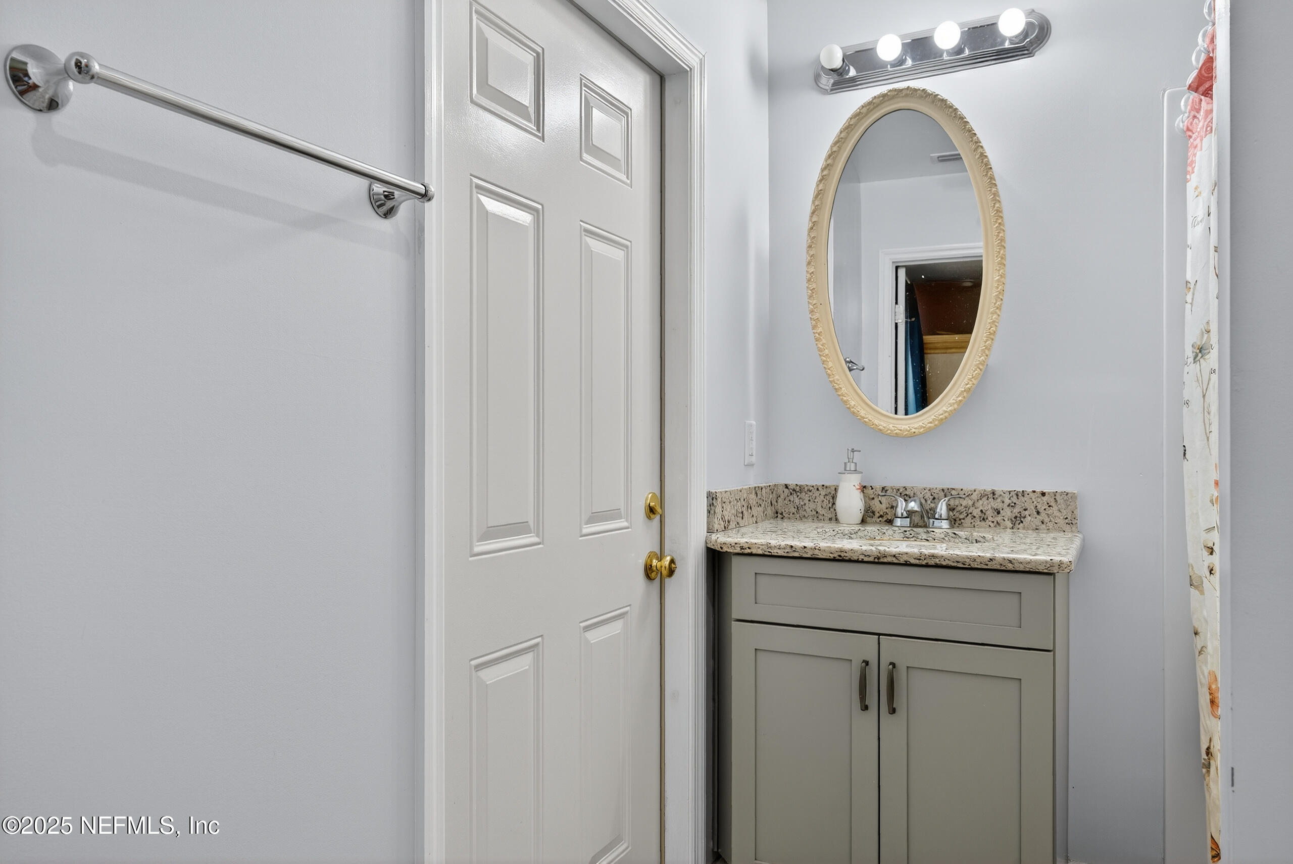 4429 Cedar Road Orange Park, FL 32065 - Photo 35 of 50 a bathroom with a sink and a mirror