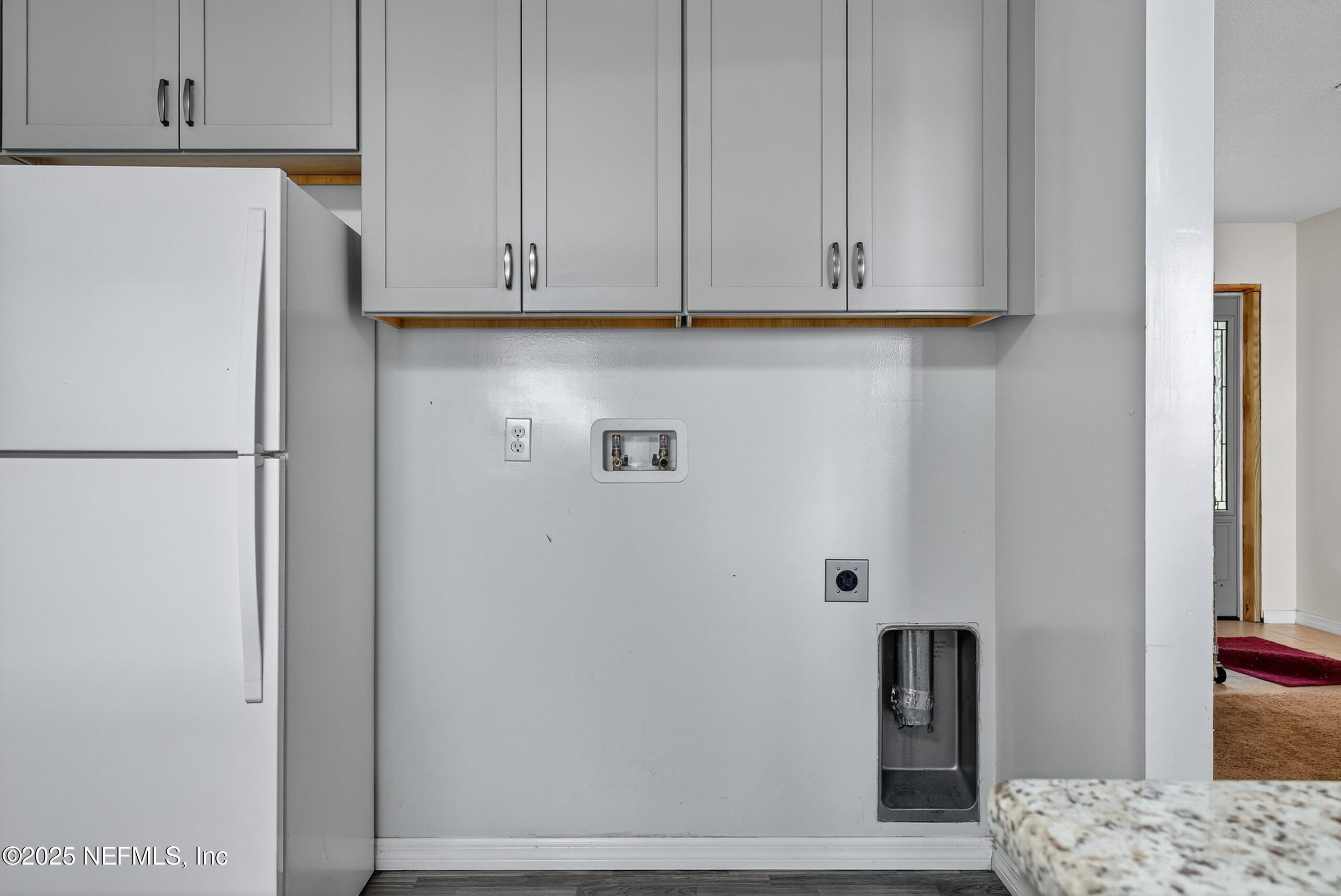 4429 Cedar Road Orange Park, FL 32065 - Photo 36 of 50 a view of cabinets and wooden floor