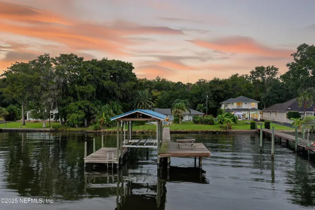 a front view of a house with lake view