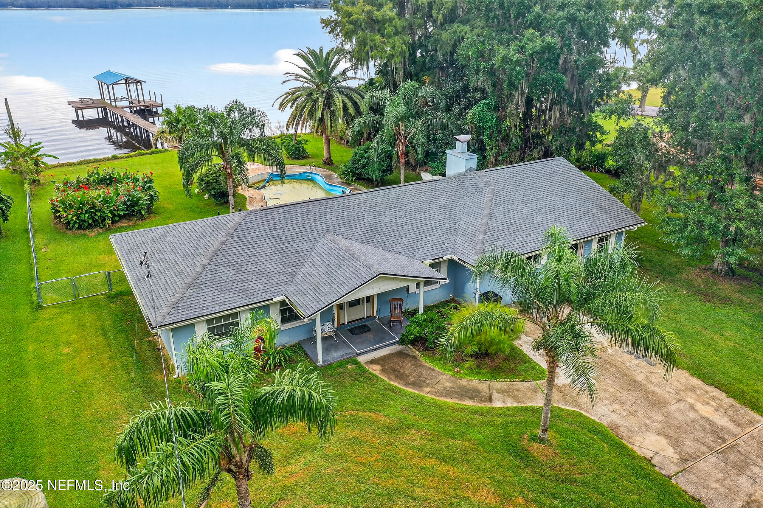 4429 Cedar Road Orange Park, FL 32065 - Photo 44 of 50 an aerial view of a house with swimming pool and garden