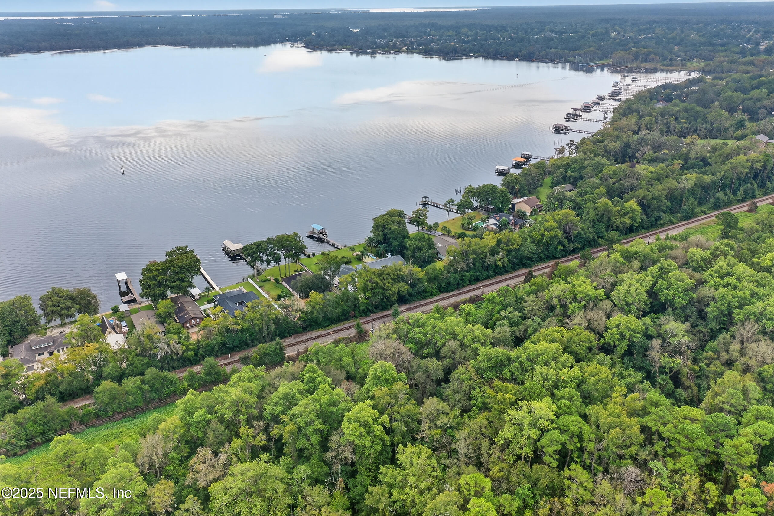 4429 Cedar Road Orange Park, FL 32065 - Photo 46 of 50 a view of a lake with a yard