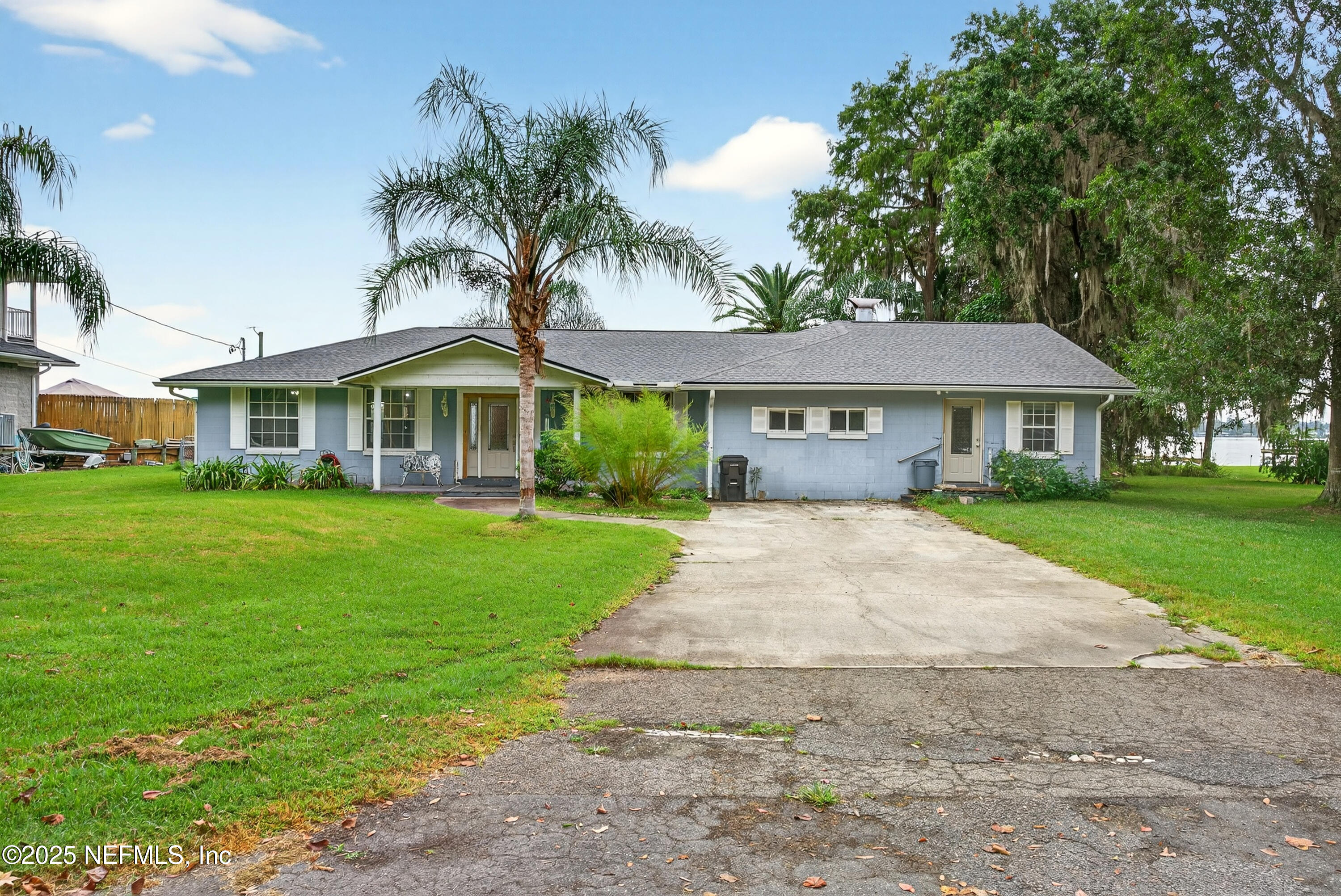 4429 Cedar Road Orange Park, FL 32065 - Photo 49 of 50 a view of house that has a yard