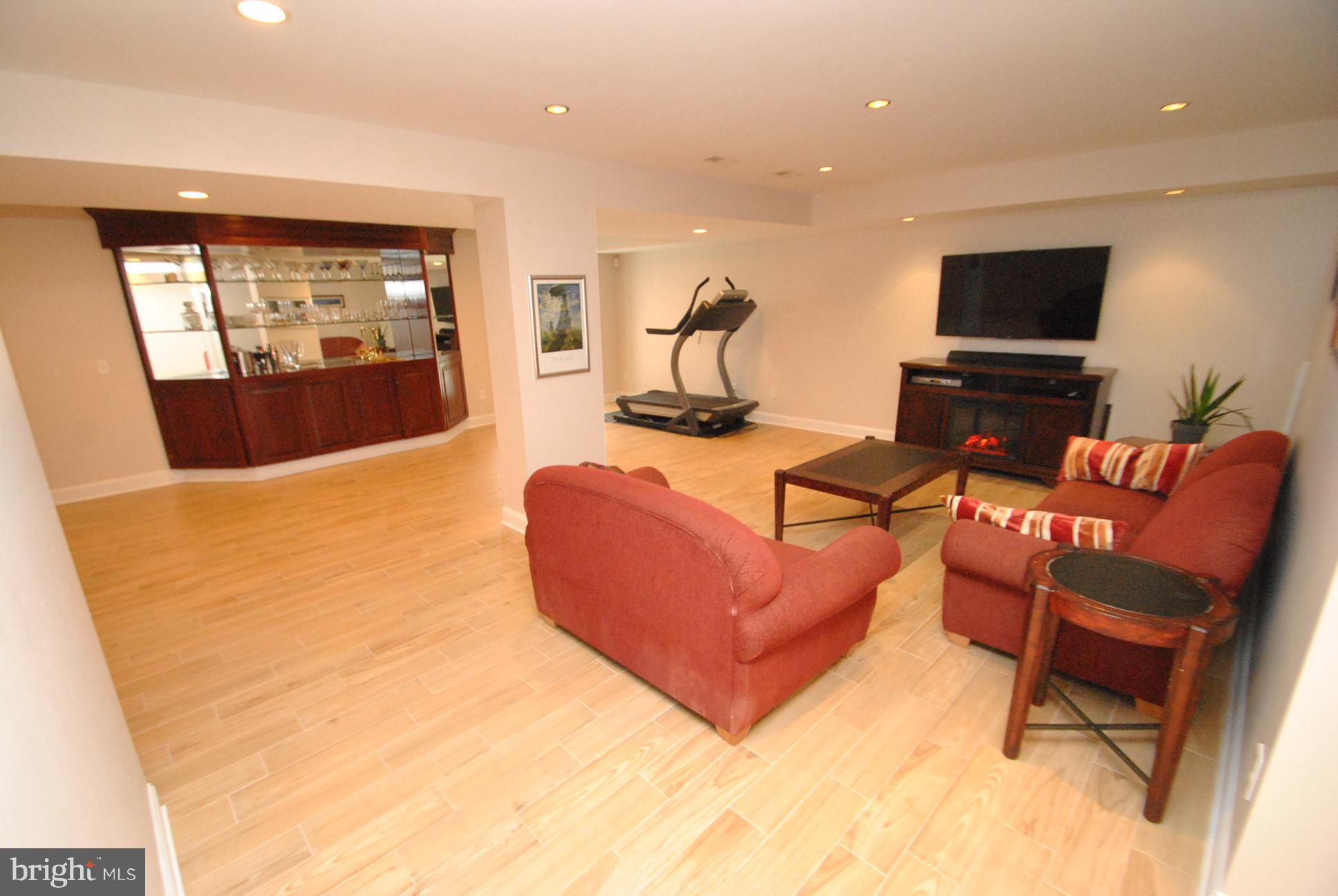 9549 Hallhurst Road Baltimore, MD 21236 - Photo 22 of 29 FULLY FINISHED WALK-OUT LEVEL WITH WET BAR AREA