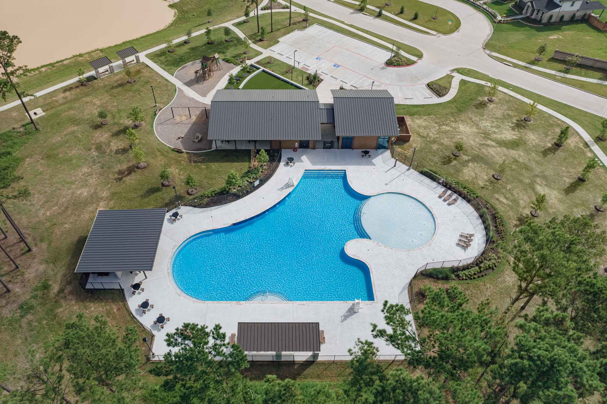 7530 Primrose Myrtle Lane Cypress, TX 77433 - Photo 8 of 11 an aerial view of a house with swimming pool and outdoor seating