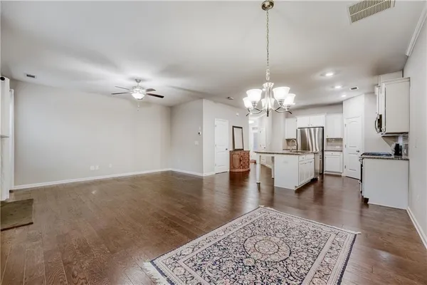 a view of a dining room and chandelier