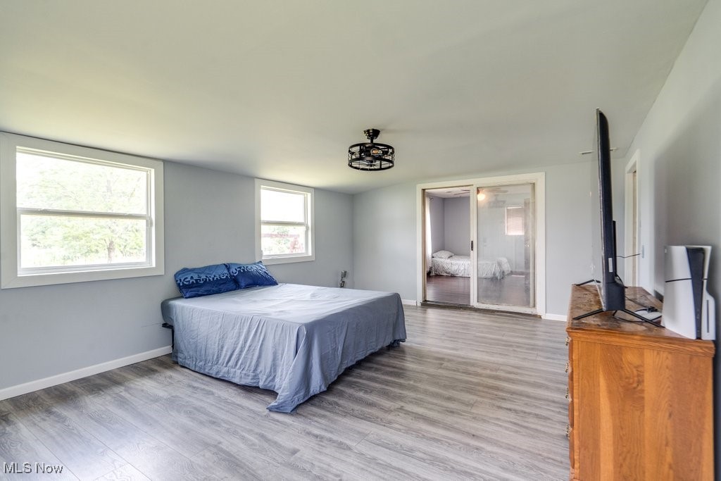 8998 Horn Road Windham, OH 44288 - Photo 29 of 34 Bedroom featuring light wood-style flooring