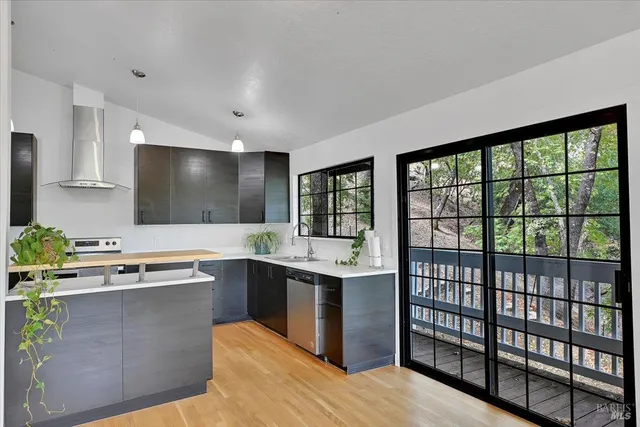 a kitchen with a sink and cabinets