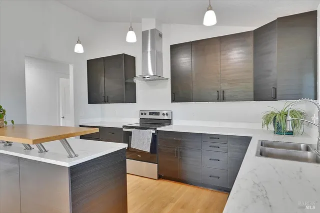 a kitchen sink sitting next to a window