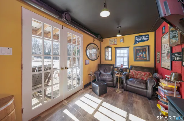 a wooden bench sitting in middle of a yard