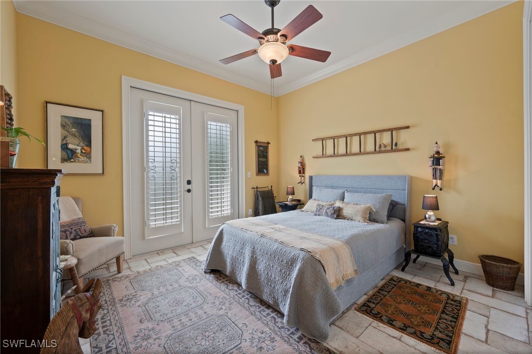 1751 Marlyn Road Fort Myers, FL 33901 - Photo 40 of 49 a bedroom with a bed and a window