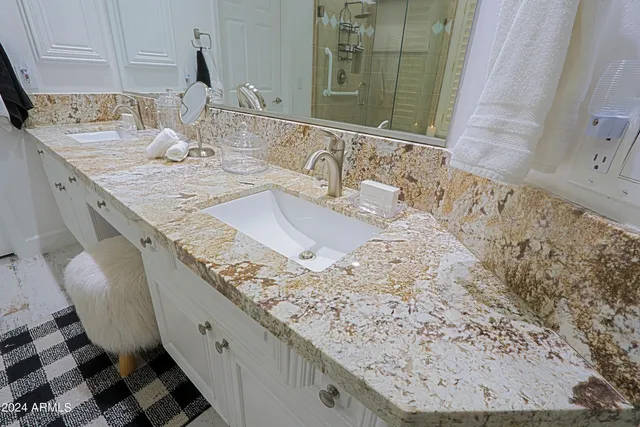 a view of a house with backyard patio and swimming pool