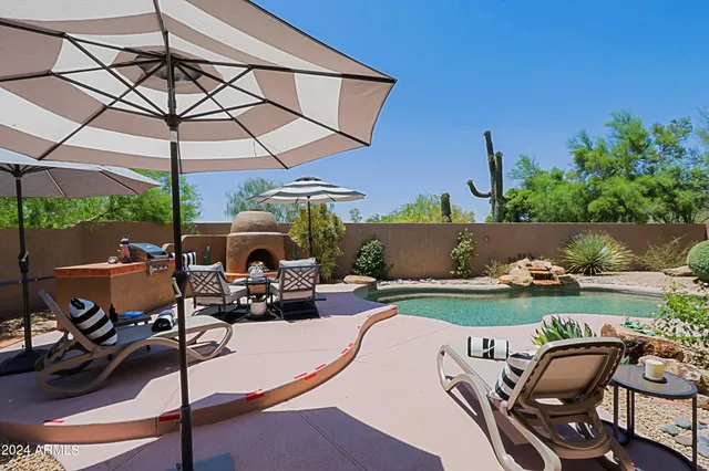 a view of an outdoor space and swimming pool