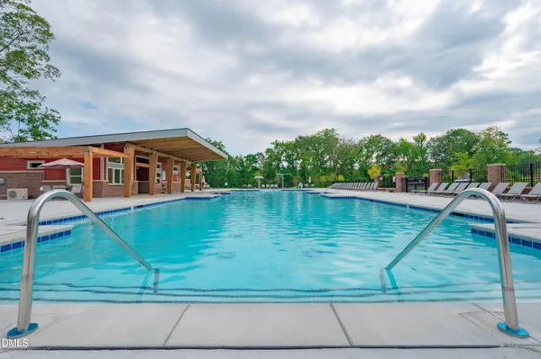 a view of a patio with a yard