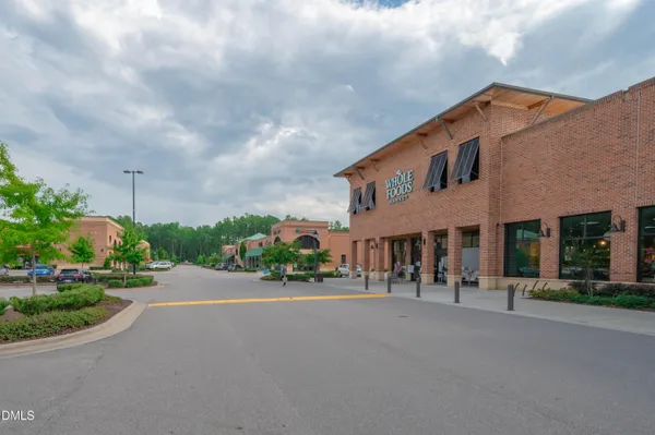 a view of a building with a street