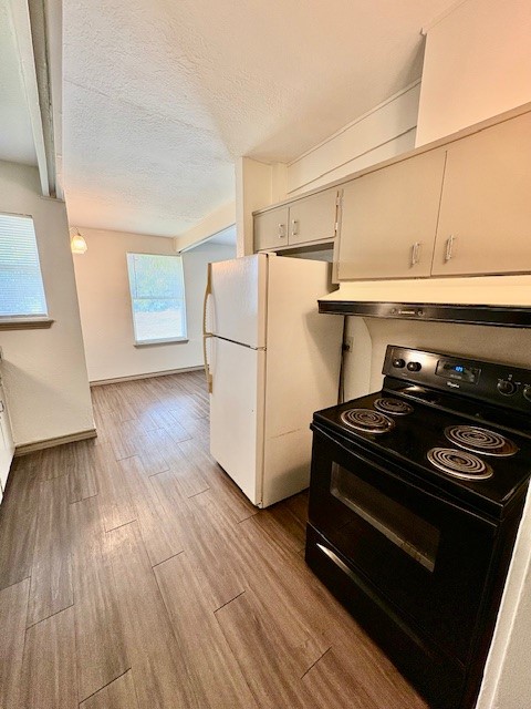 730 Sam Street Corpus Christi, TX 78411 - Photo 3 of 8 a stove top oven sitting inside of a kitchen