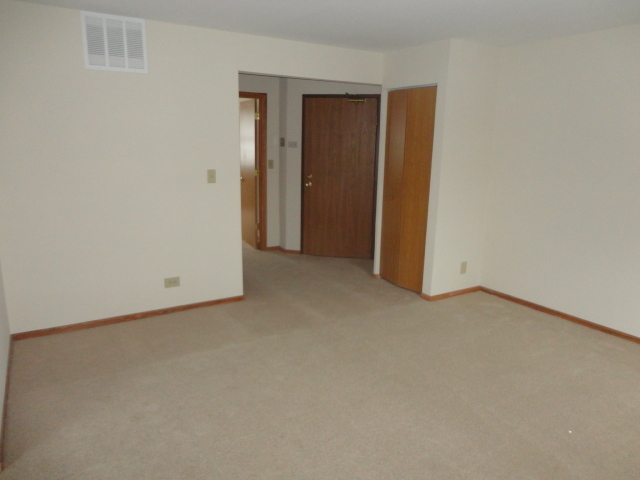 3 North Victoria Lane, Unit B Streamwood, IL 60107 - Photo 7 of 11 an empty room with closet area