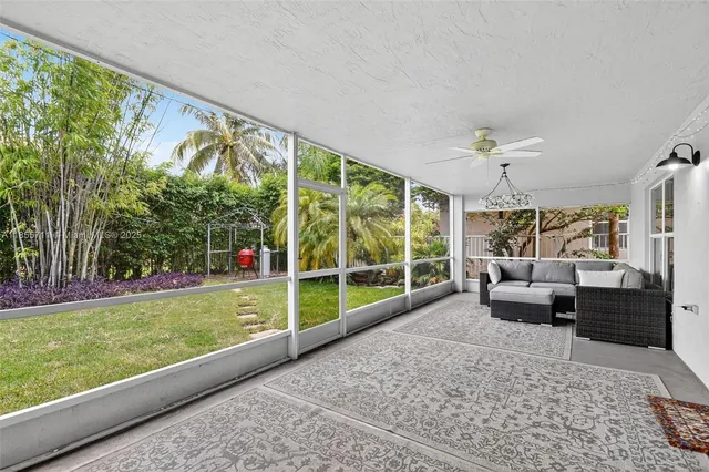 a view of a swimming pool with a lounge chairs