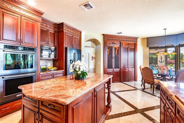 a spacious bathroom with a granite countertop tub and a sink