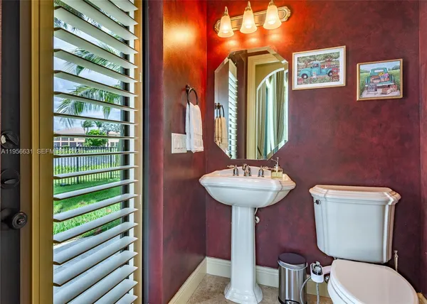 a view of a backyard with sitting area and furniture