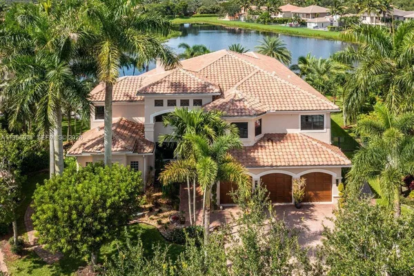 a kitchen with granite countertop stainless steel appliances and cabinets