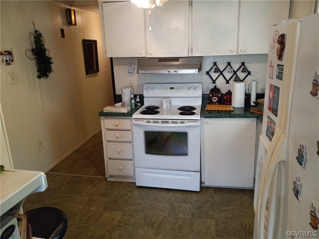 1701 Rocky Ford Road Crewe, VA 23930 - Photo 3 of 5 a kitchen with a stove and a refrigerator