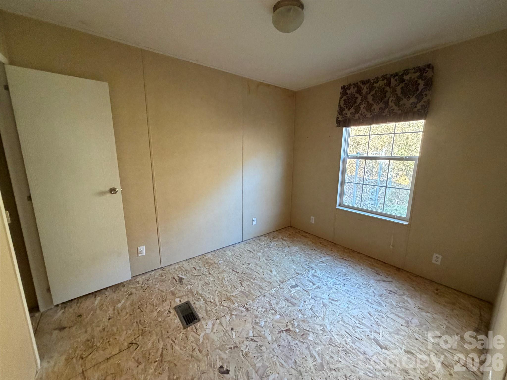 101 Highview Drive Maggie Valley, NC 28751 - Photo 13 of 29 a view of an empty room and window