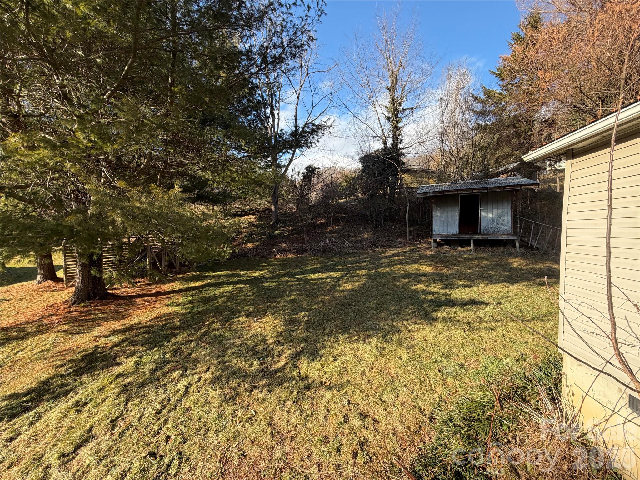 101 Highview Drive Maggie Valley, NC 28751 - Photo 17 of 29 a view of a yard with an outdoor space