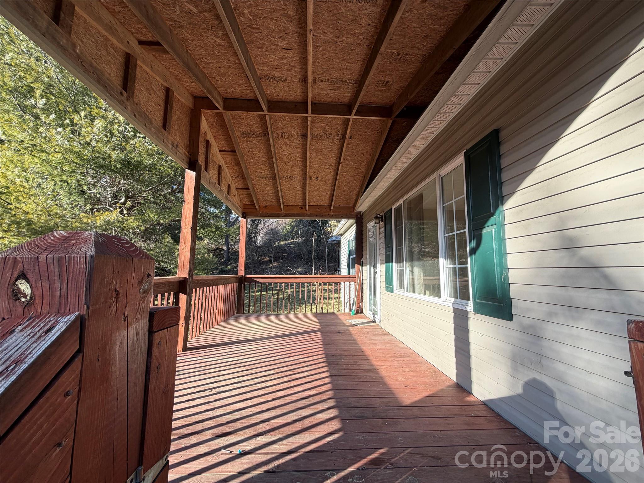 101 Highview Drive Maggie Valley, NC 28751 - Photo 18 of 29 a view of a patio with wooden floor