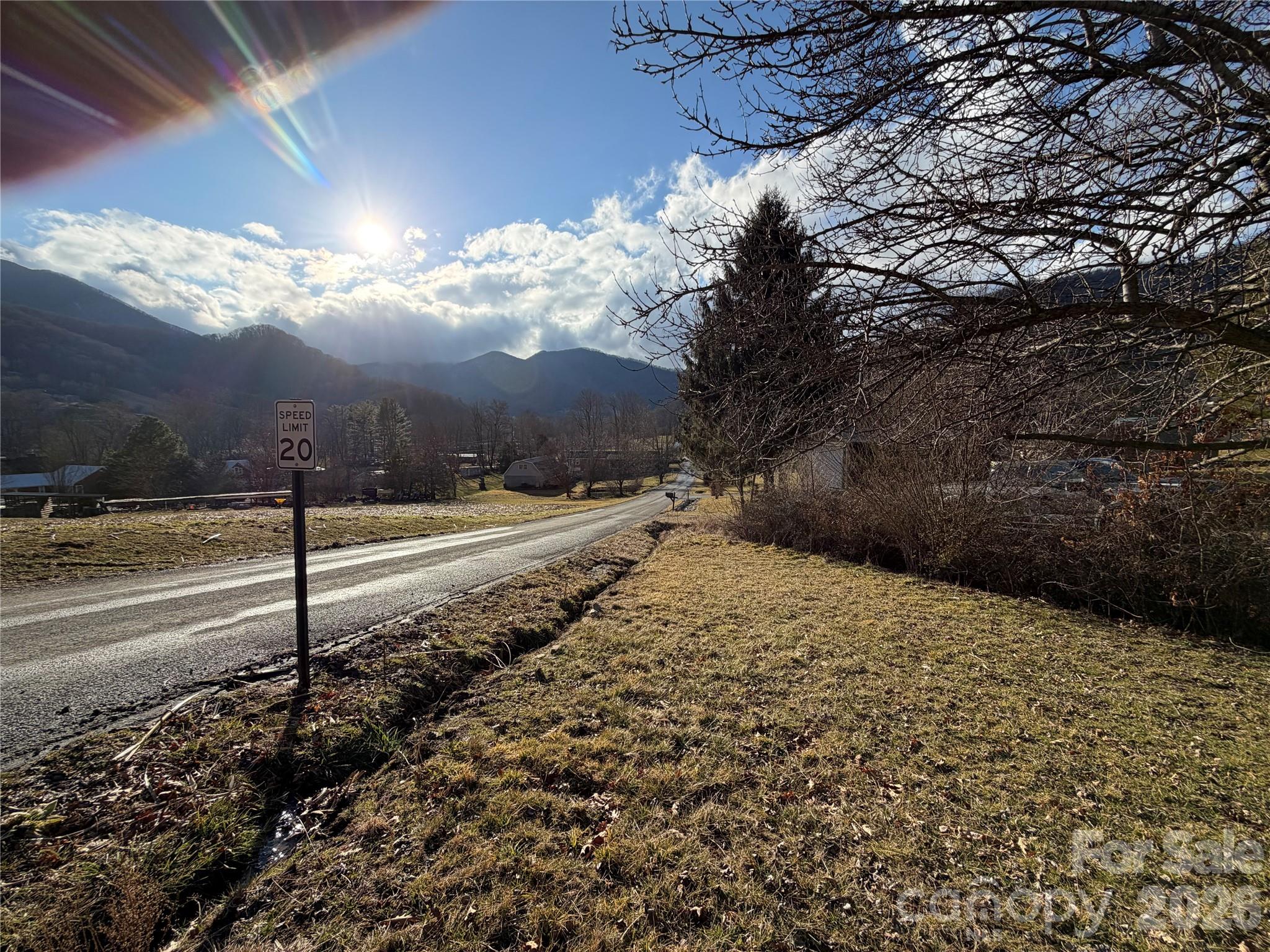 101 Highview Drive Maggie Valley, NC 28751 - Photo 24 of 29 a view of a road with a yard