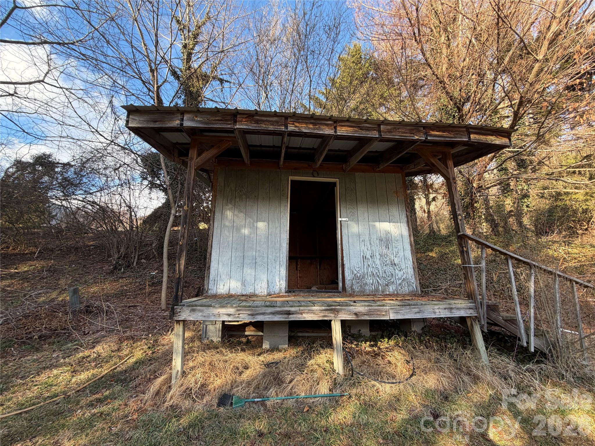 101 Highview Drive Maggie Valley, NC 28751 - Photo 27 of 29 a view of house with backyard and outdoor seating