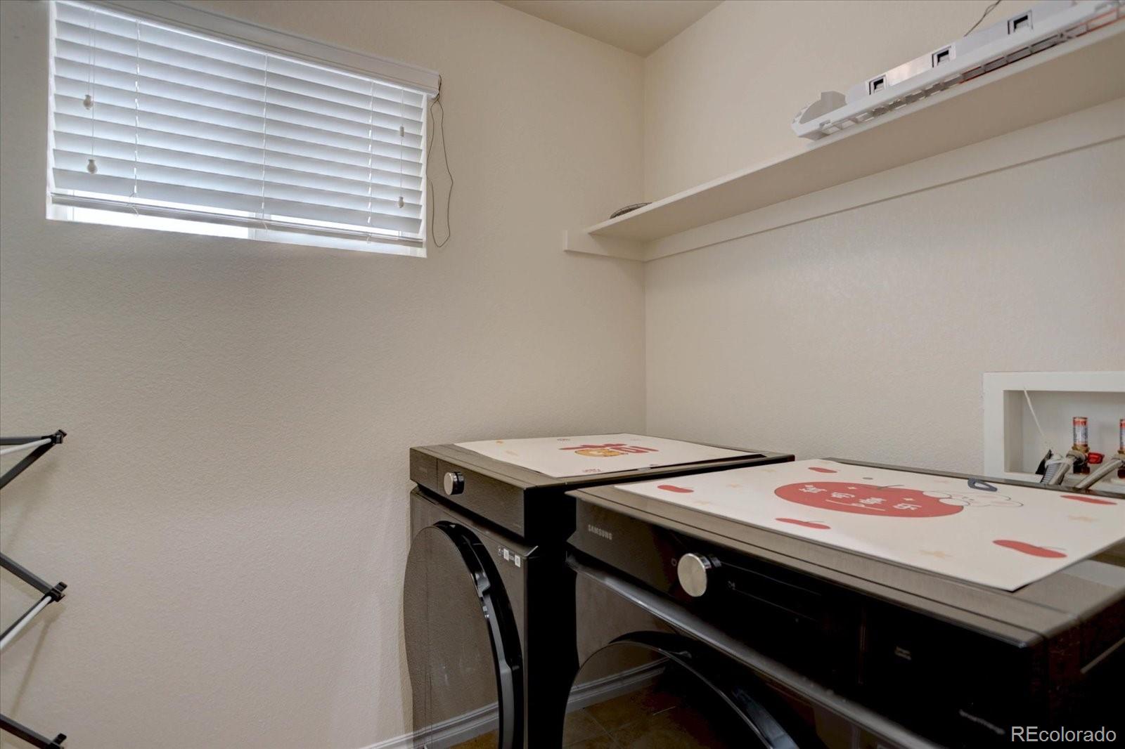 5300 Fullerton Lane Highlands Ranch, CO 80130 - Photo 24 of 31 a room that has a bed and a window