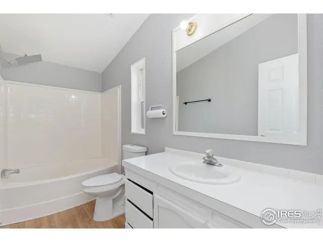 a bathroom with a sink a toilet and a bathtub