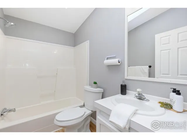 a bathroom with a sink a toilet and a bathtub